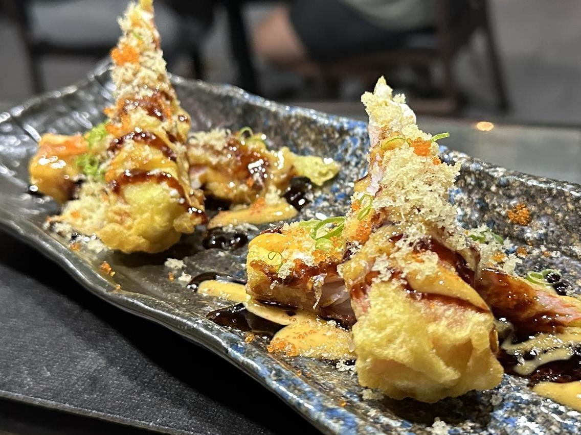 Noriya-Japanese-Cuisine-Restaurant-Crispy-Seafood-Tempura-Decatur Crispy seafood tempura with drizzled sauces and toppings at Noriya Japanese Cuisine, a Japanese Restaurant in Decatur