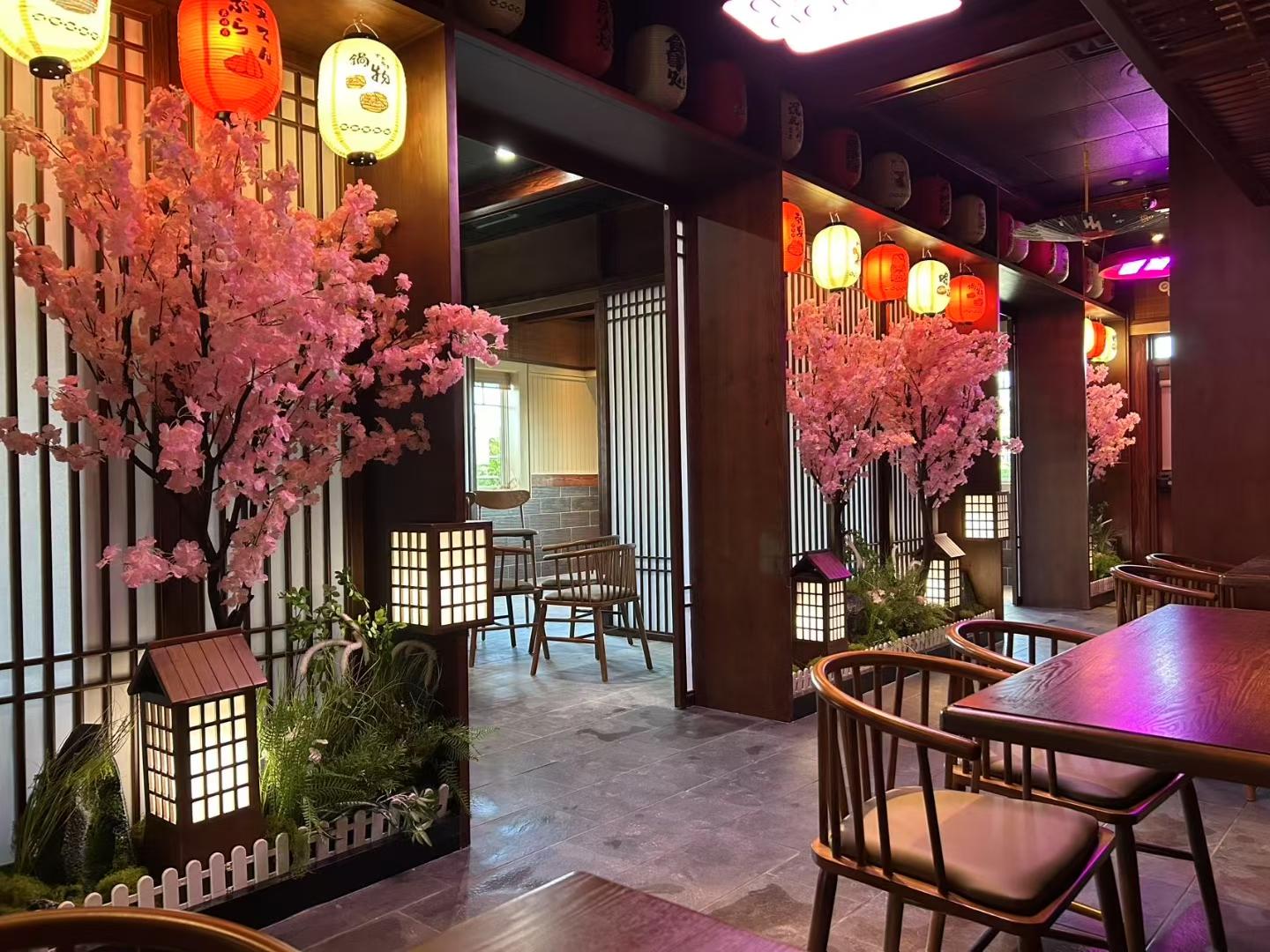 Noriya-Japanese-Cuisine-Restaurant-Charming-Interior-Decor-Decatur Charming interior of Noriya with lanterns and cherry blossom trees at Noriya Japanese Cuisine, a Japanese Restaurant in Decatur