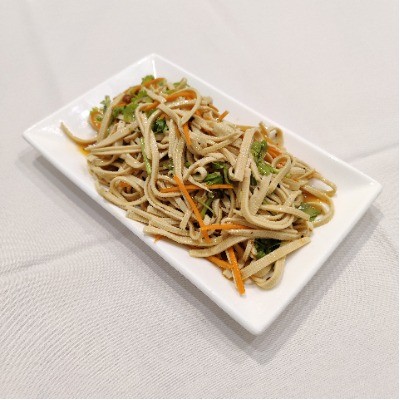 Cold shredded tofu skin mixed with carrot and coriander.
