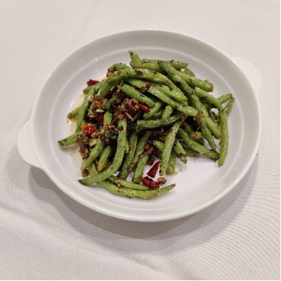 Dry‑fried green beans with minced garlic and dried chili.