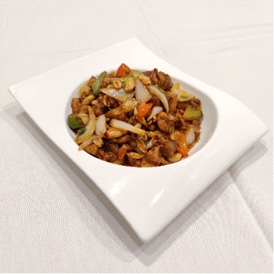 Kung pao chicken with peanuts, pepper and onion chunks.