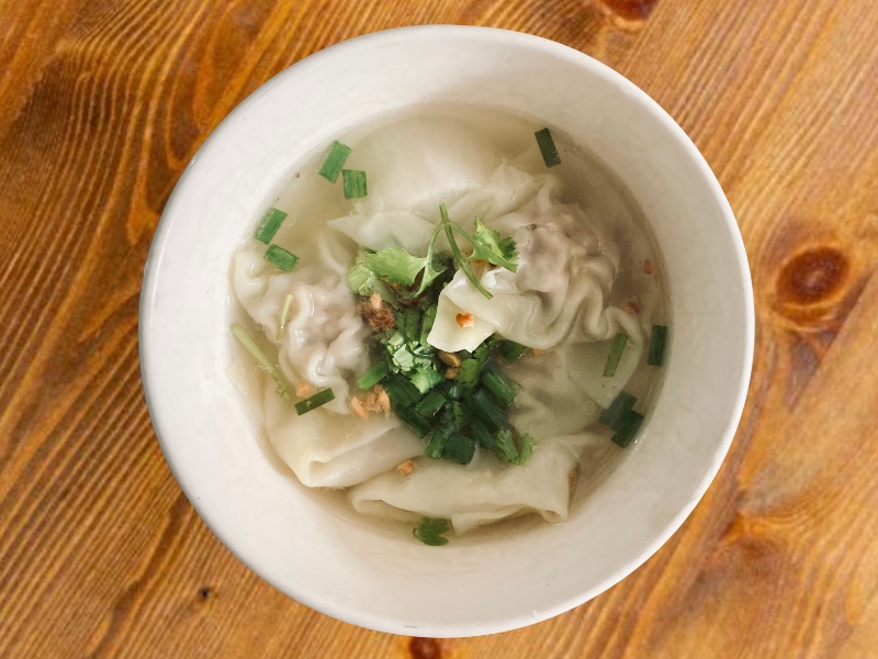 Wonton soup with scallions, cilantro and crispy toppings at Northern Cafe, a Chinese Restaurant in CA