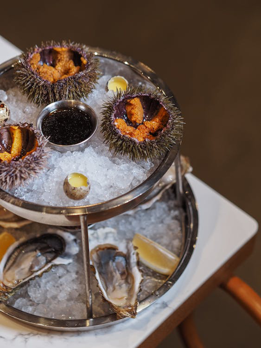 Sea urchin and oyster seafood platter on ice at Ocean 7 Boiling Seafood & Bar Restaurant in Olympia