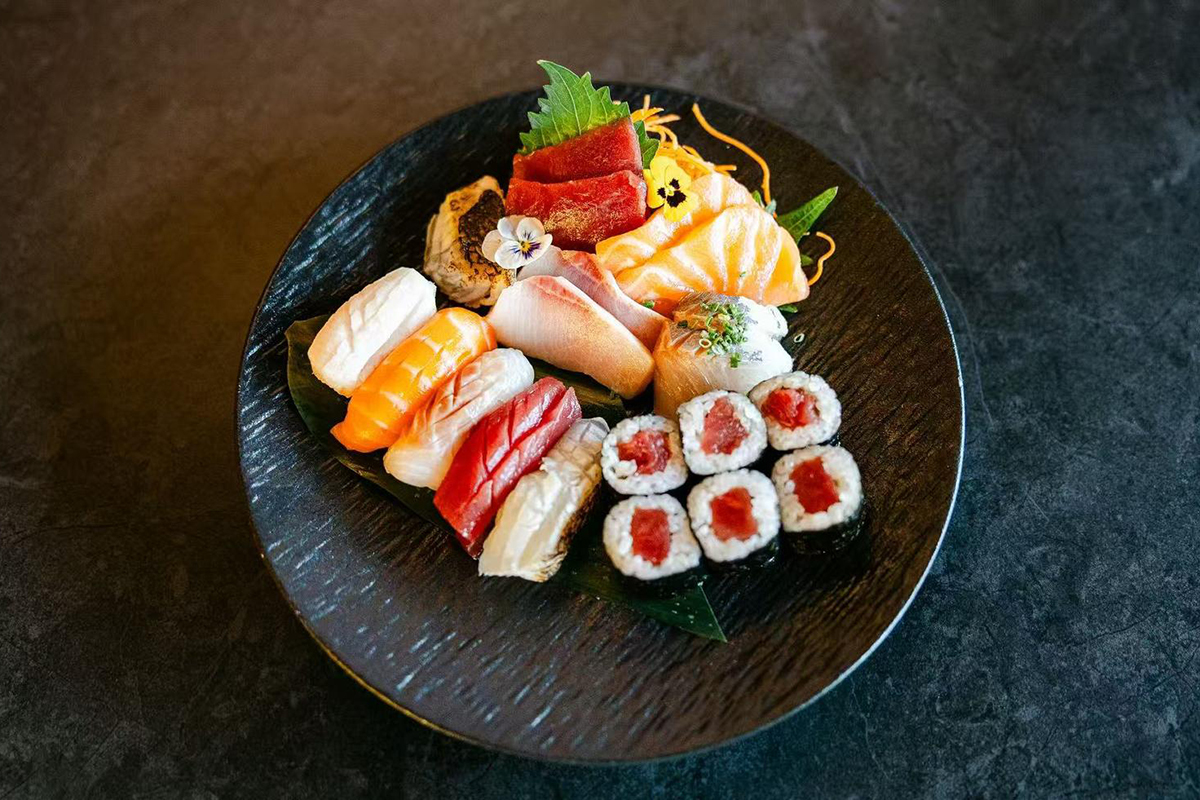5 pieces of sushi, 9 pieces of fresh sashimi, and one tuna roll at Oishii Express, a Japanese Restaurant in Oklahoma City
