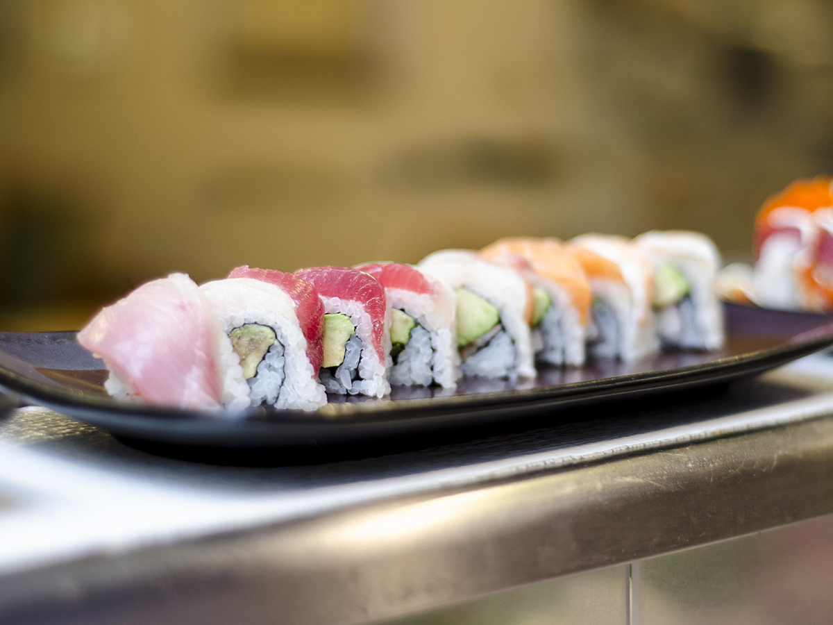 Assorted tuna and salmon avocado sushi rolls at Oishii Express, a Japanese Restaurant in Oklahoma City