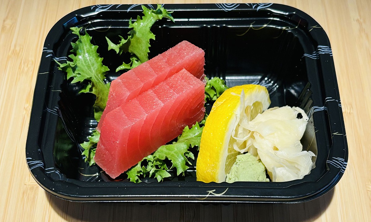 Fresh tuna sashimi with lemon, wasabi, and ginger at Oishi Sushi Express, a Japanese Restaurant in Cherry Hill Township