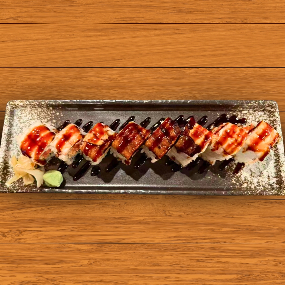 Okayama-Sushi-&-Hibachi-Japanese-Restaurant-Sushi-Roll-with-Sauce-Orlando Sushi roll drizzled with rich sauces, served with ginger and wasabi at Okayama Sushi & Hibachi, a Japanese Restaurant in Orlando