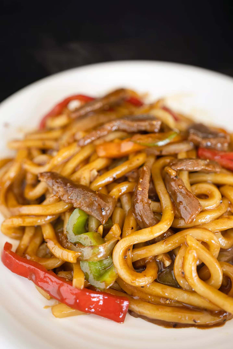 Beef udon noodles with vegetables at One More Bite Dumpling House, a Chinese Restaurant in Chino
