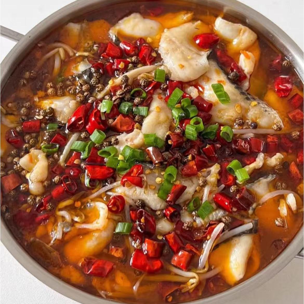 Fish stewed in spicy broth with chili peppers, Sichuan peppercorns, and scallions at Opera House, a Chinese restaurant in Philadelphia