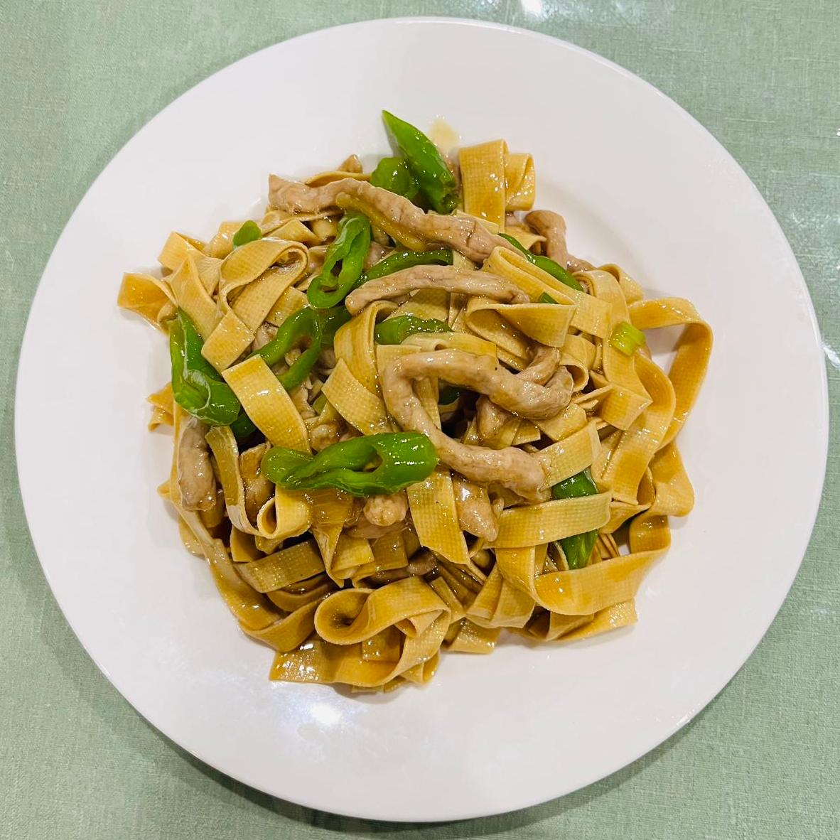 Stir - fried shredded pork with beancurd skin and green peppers at Opera House, a Chinese restaurant in Philadelphia