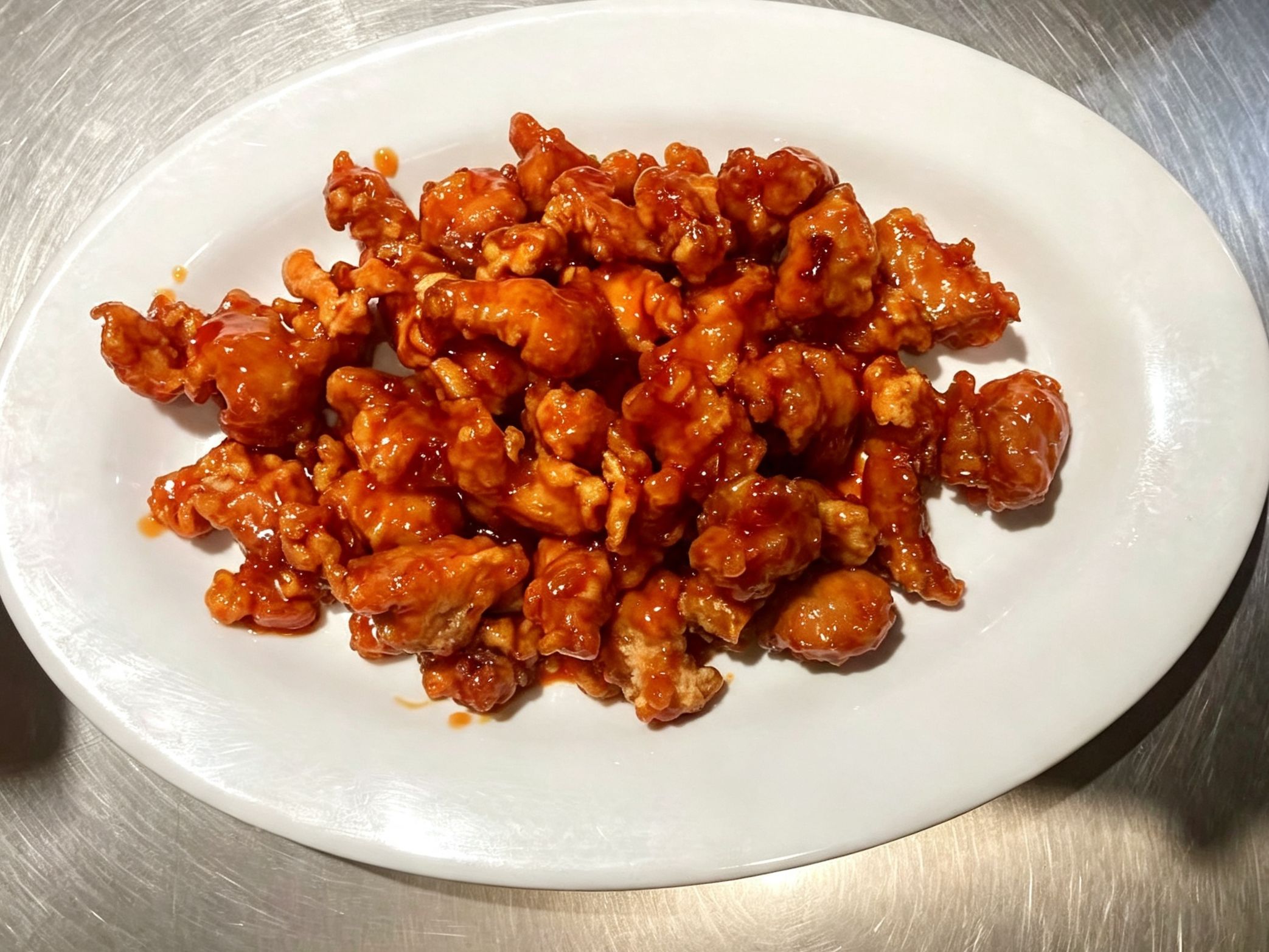 Sweet crispy saucy orange chicken chunks at China Fortune | Chinese Food，a Chinese Restaurant in Layton