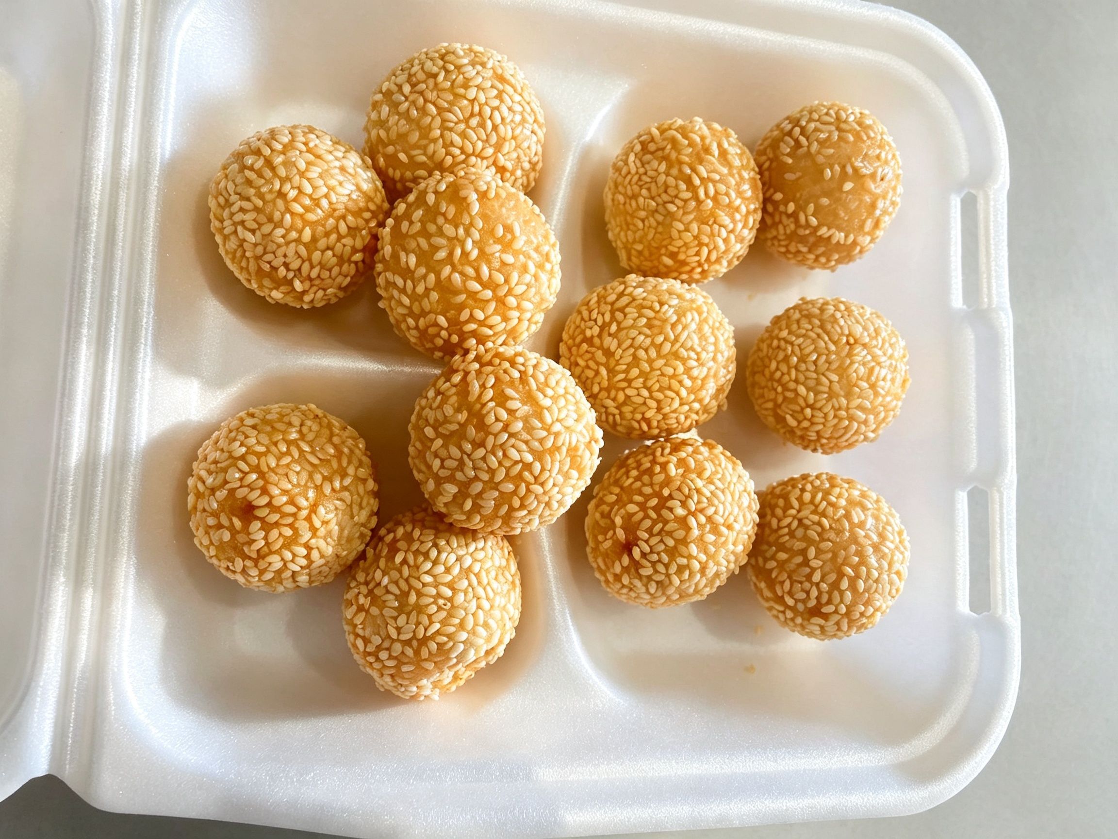 Round golden crispy fried sesame balls at China Fortune | Chinese Food，a Chinese Restaurant in Layton