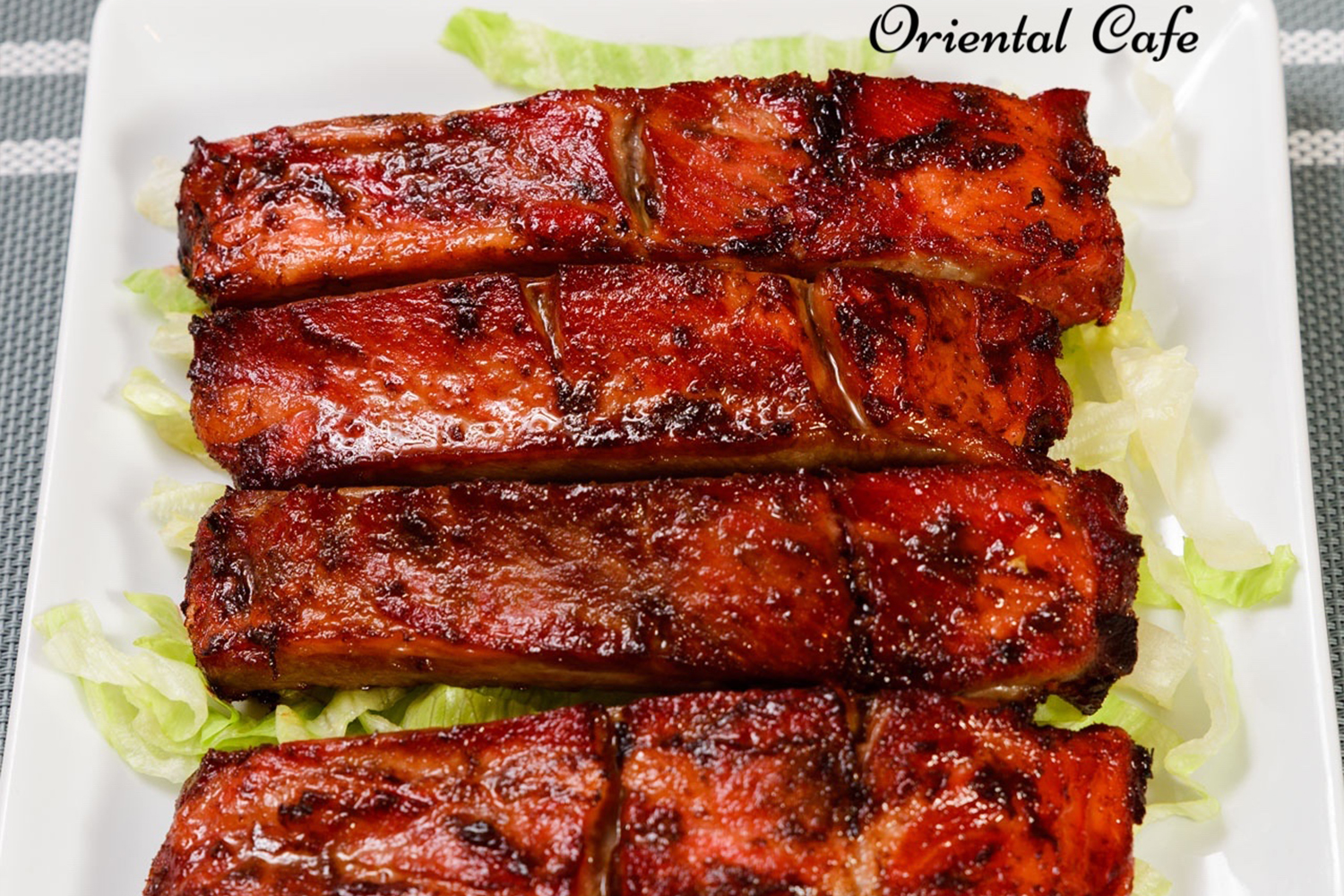 Glazed barbecued spare ribs on a bed of lettuce at Oriental Cafe, a Chinese Restaurant in Rockville