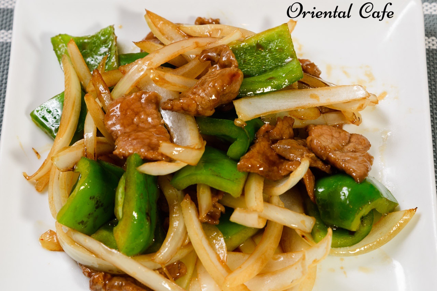 Stir-fried beef with green peppers and onions at Oriental Cafe, a Chinese Restaurant in Rockville
