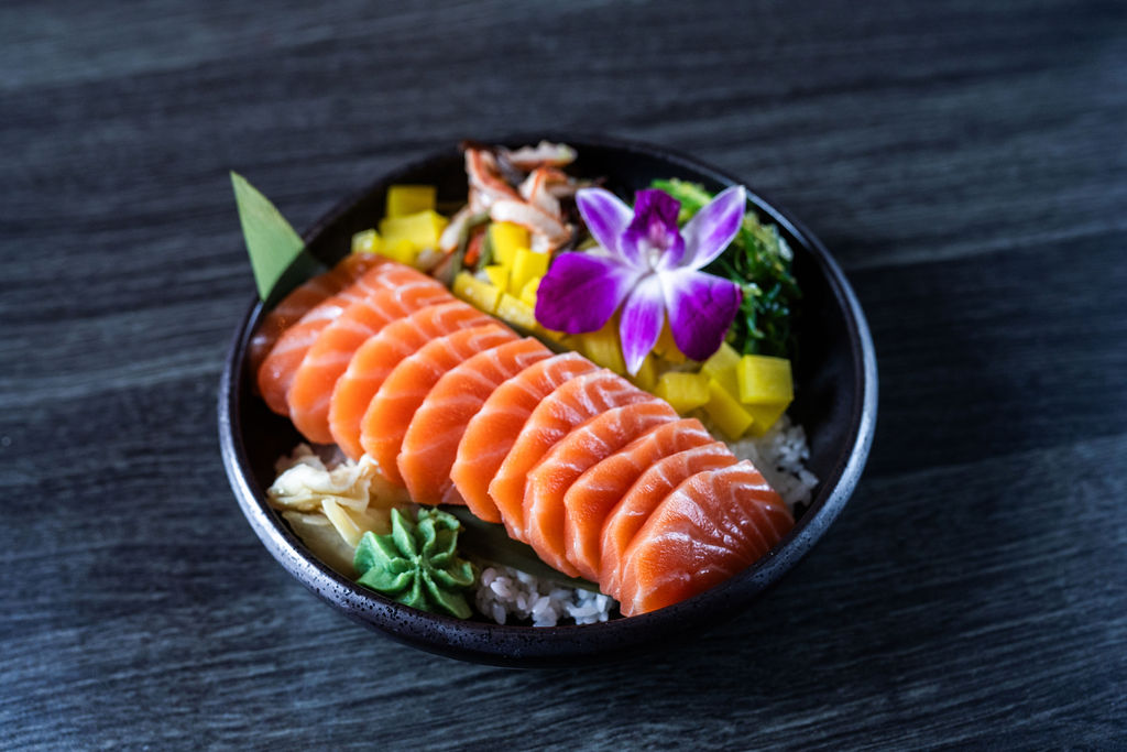 Fresh salmon donburi rice bowl with sashimi at Origami Asian Fusion Exton, an Asian Fusion Restaurant in Exton