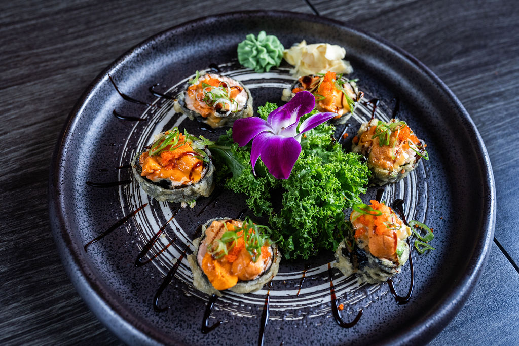 Signature baked sushi rolls with garnishes at Origami Asian Fusion Exton, an Asian Fusion Restaurant in Exton