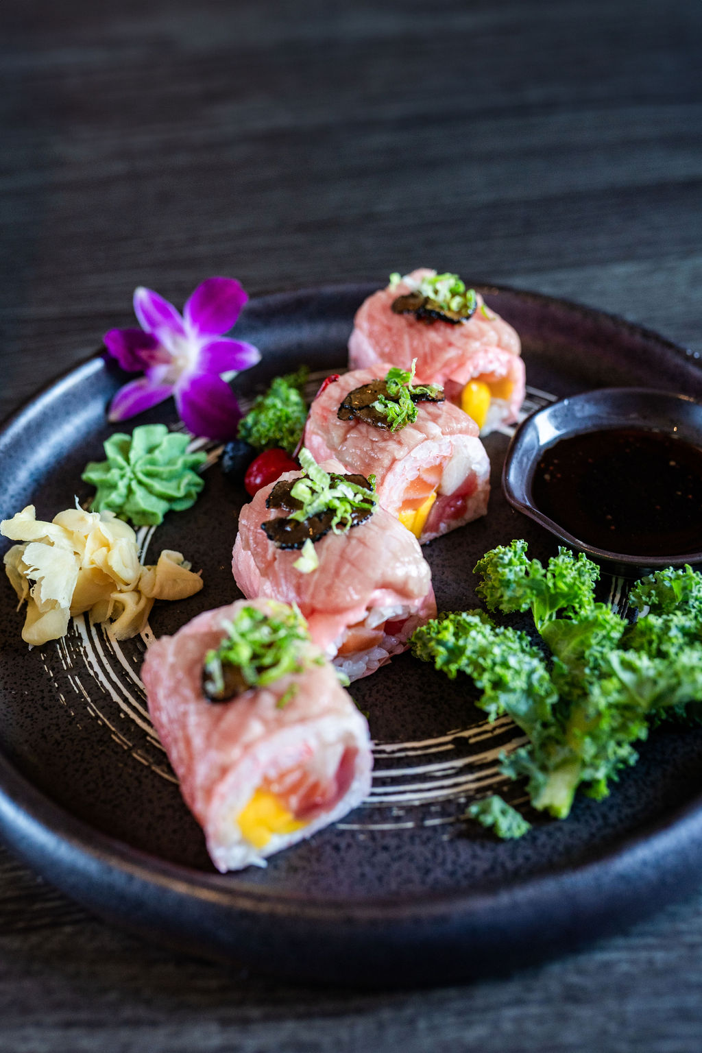 Signature tuna sushi roll with truffle and garnishes at Origami Asian Fusion Exton, an Asian Fusion Restaurant in Exton