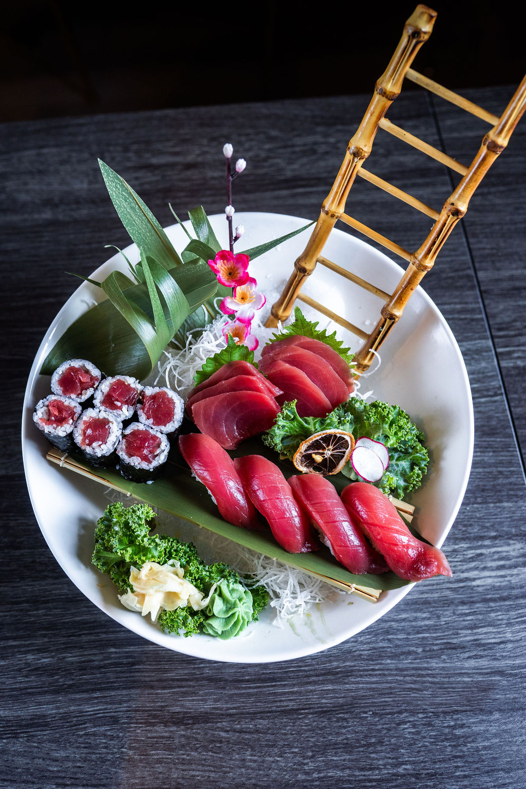 Elevated tuna sushi platter with bamboo ladder at Origami Asian Fusion Exton, an Asian Fusion Restaurant in Exton