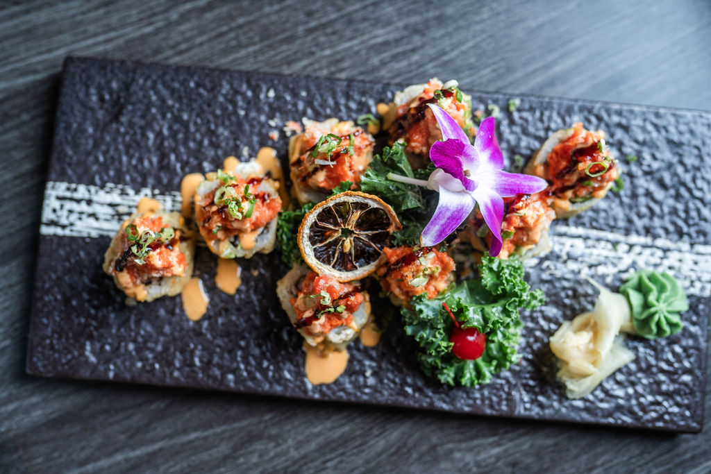 Volcano sushi roll with spicy seafood toppings and sauces at Origami Asian Fusion Exton, an Asian Fusion Restaurant in Exton