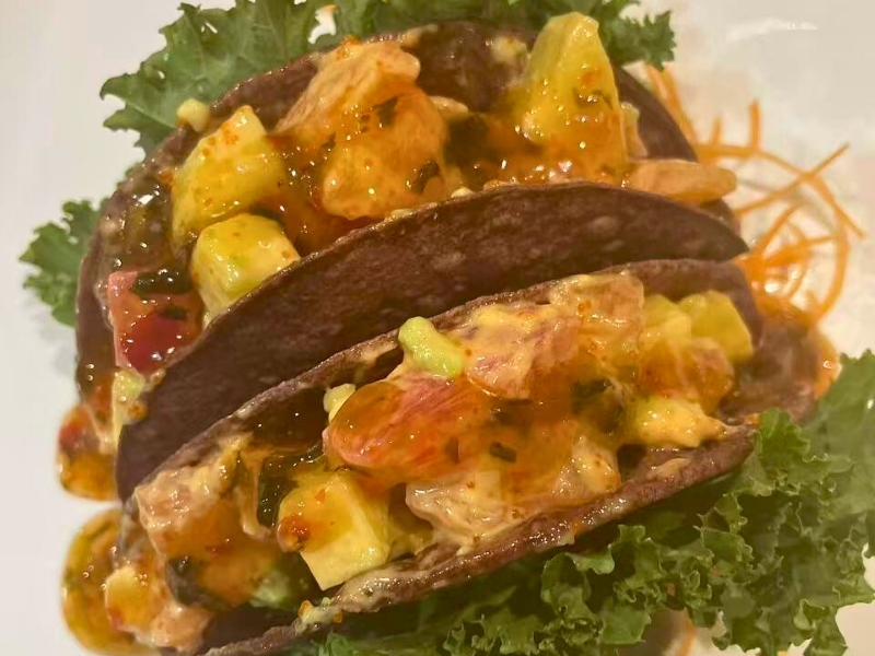 Blue corn tortilla taco filled with fresh sashimi and mango at Osaka Sushi Hibachi Asian Kitchen, a Asian Restaurant in Lake City