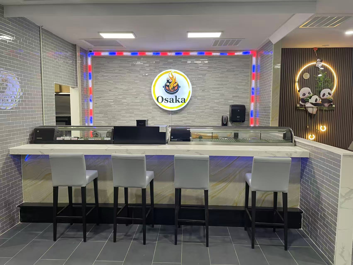 Osaka sushi boat platter with assorted sashimi, sushi, and Osaka branding