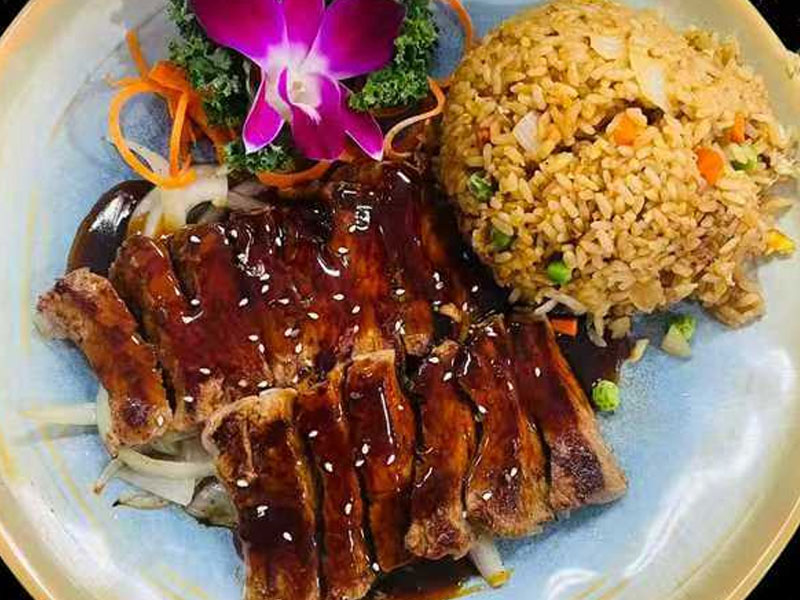 Steak teriyaki with fried rice plated at Osaka Sushi Hibachi Asian Kitchen, a Asian Restaurant in Lake City