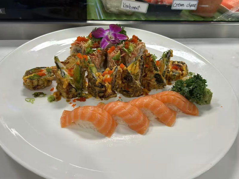 Sushi platter with salmon nigiri fried rolls at Osaka Sushi Hibachi Asian Kitchen, a Asian Restaurant in Lake City