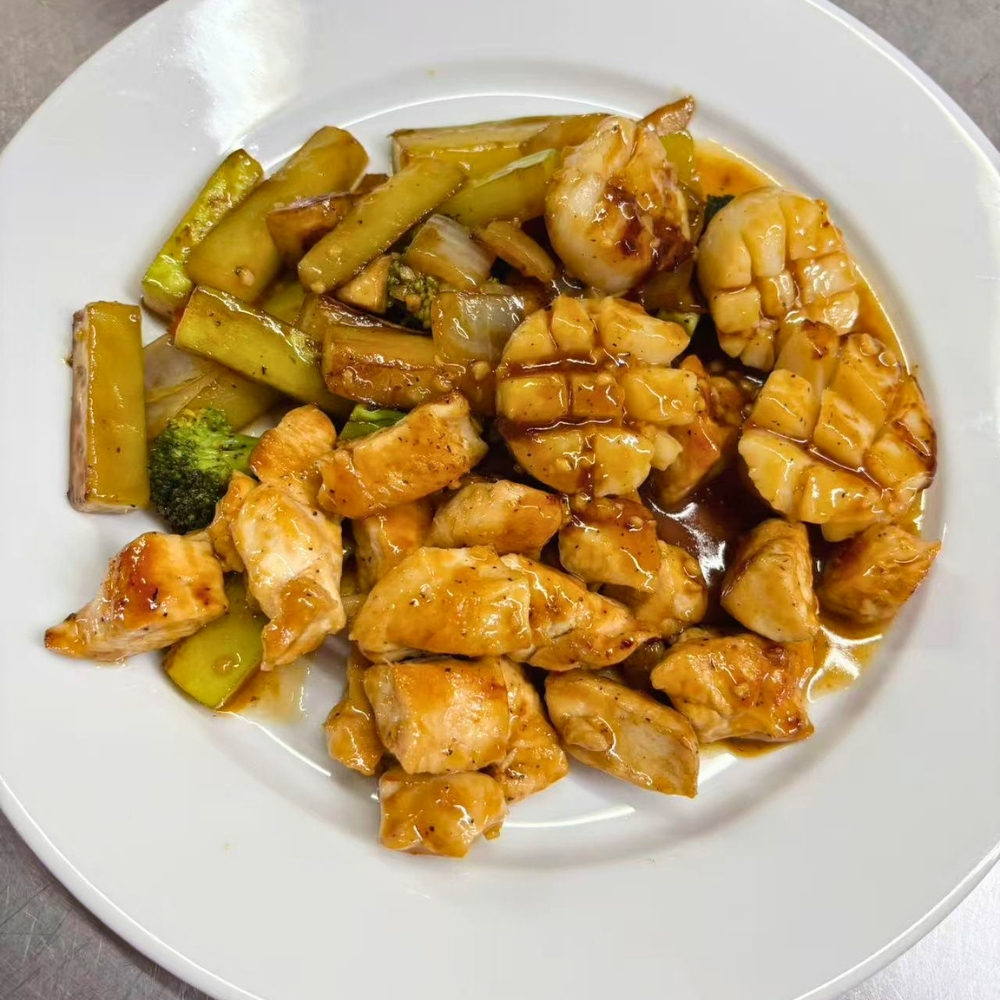 Teriyaki chicken and scallops with vegetables at Osaki Japanese Restaurant, a Japanese Restaurant in Hays