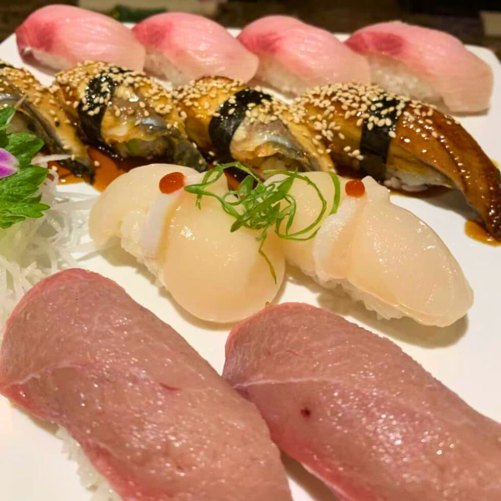 Assorted premium nigiri sushi with eel and scallops