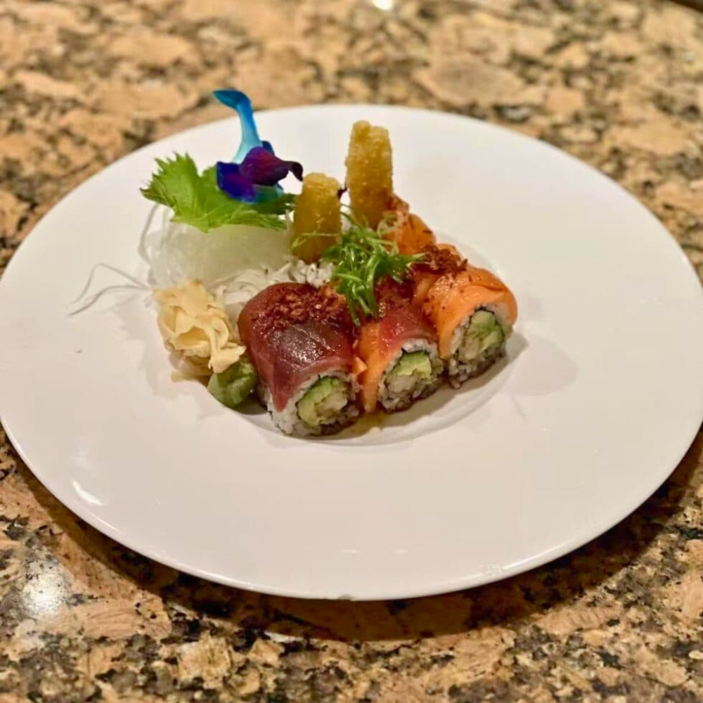 Creative tuna and salmon maki on white plate at Pacific Asian Bistro, a Japanese Restaurant in St. Augustine