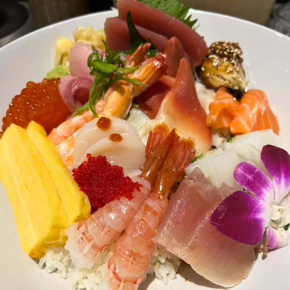 Gourmet seafood donburi with assorted sashimi and toppings