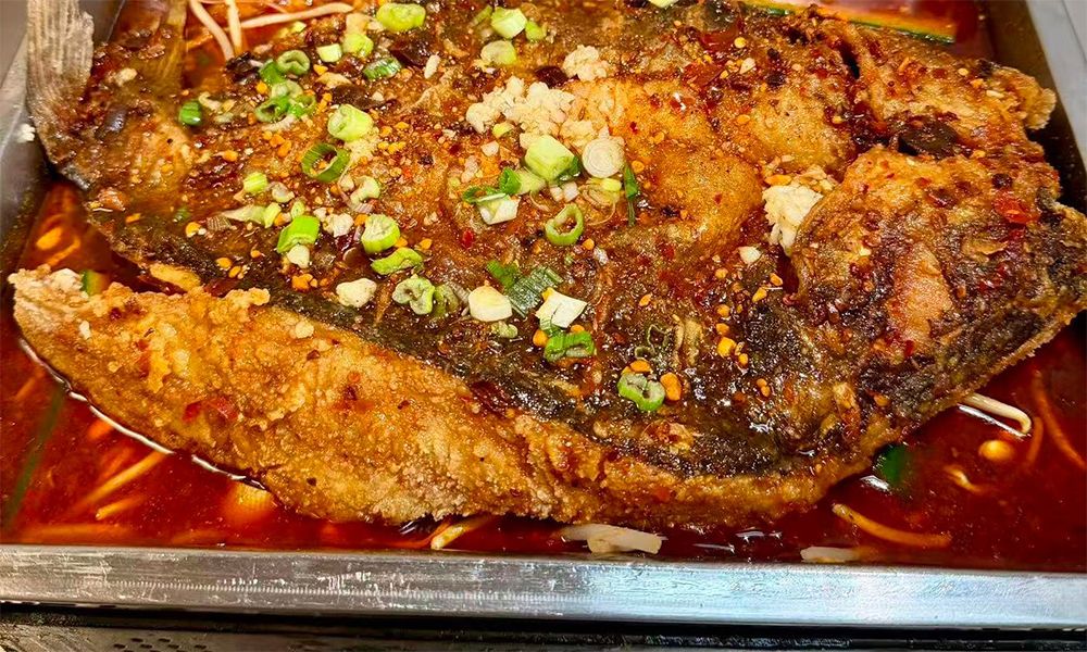 Pacific-Eatery-Chinese-Restaurant-Grilled-Fish-Kenny-Rd-Columbus Whole fish grilled in spicy sauce, tender and spicy at Pacific Eatery Restaurant in Kenny Rd, Columbus