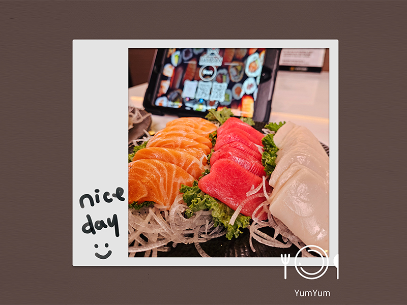 Fresh salmon, tuna, and white fish sashimi at Pakusan Sushi & Grill, a Japanese Restaurant in Chandler