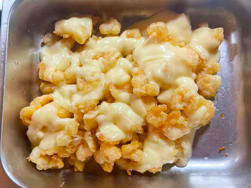 Crispy bites covered in creamy cheese at Panda Buffet, a Buffet Restaurant in Cushing