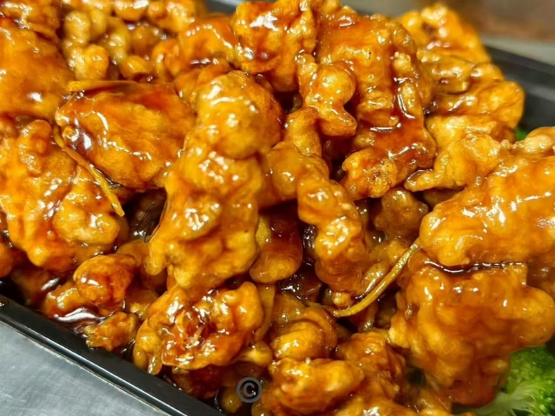 Chicken in sweet orange - flavored sauce at Panda Buffet Chinese Food, a Chinese Restaurant in Willoughby