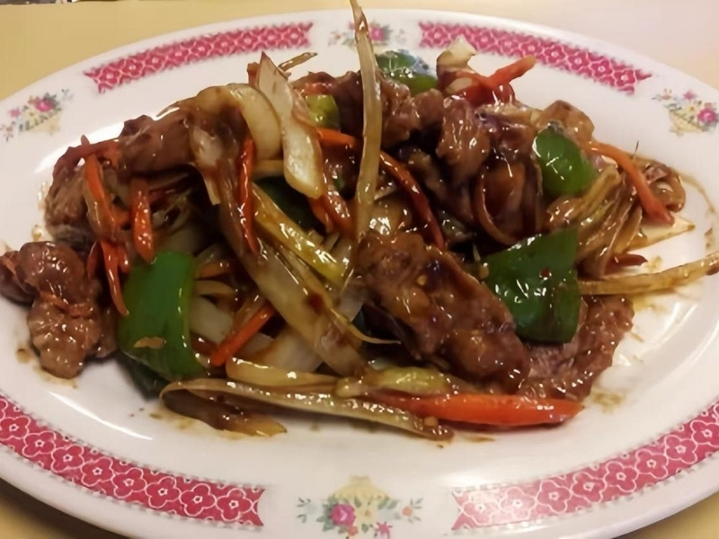 Savory beef stir-fry with onions, peppers, and carrots at Panda Hibachi, a Chinese Restaurant in Duncan