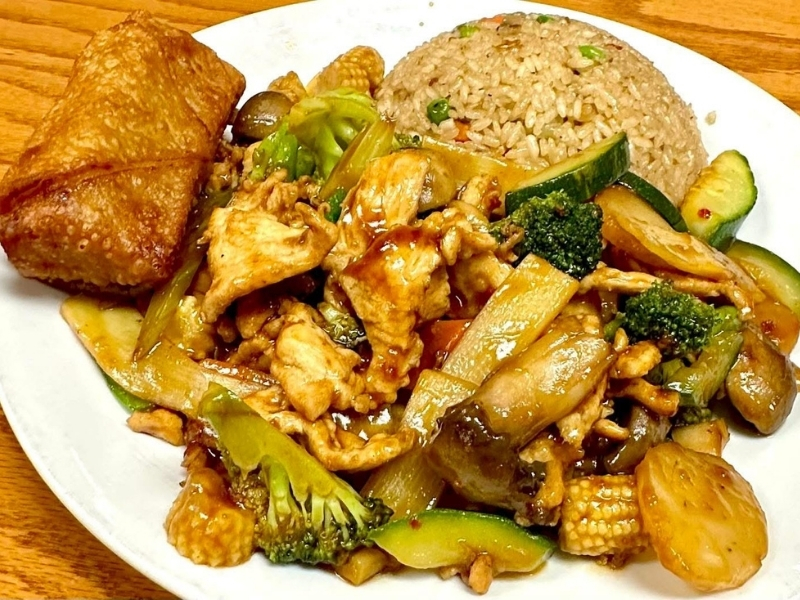 Chicken and vegetable stir-fry with fried tofu and brown rice at Panda Hibachi, a Chinese Restaurant in Duncan