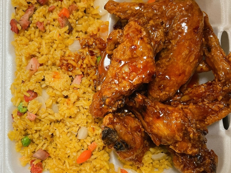 Crispy glazed chicken wings served with pork fried rice at Panda Hibachi, a Chinese Restaurant in Duncan