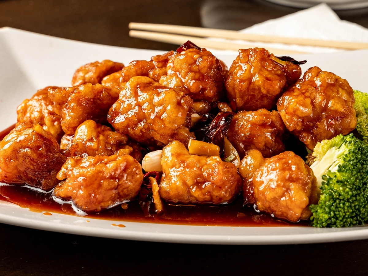 Braised spicy crispy chicken chunks with rich glossy sauce at Panda Chinese Restaurant in Hattiesburg