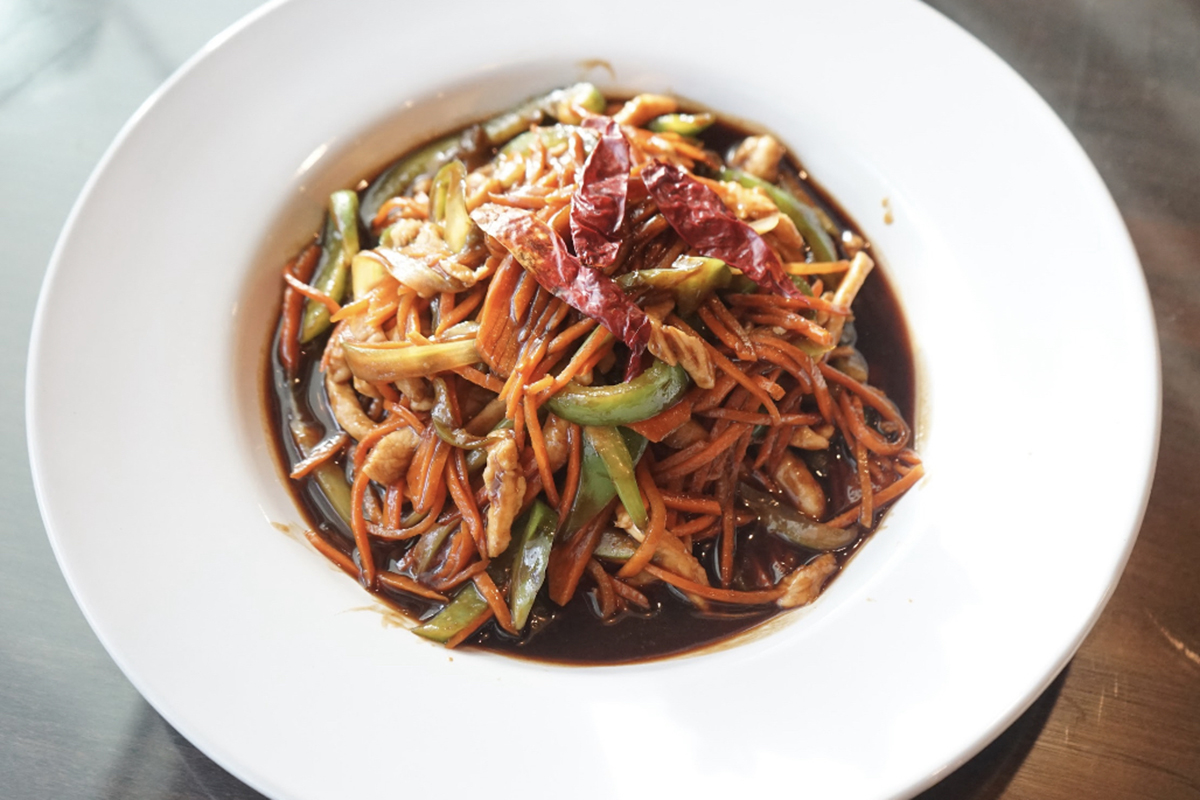 Shredded pork with carrots, peppers, and chili in savory sauce at Peking Gourmet, a Chinese Restaurant in Frederick