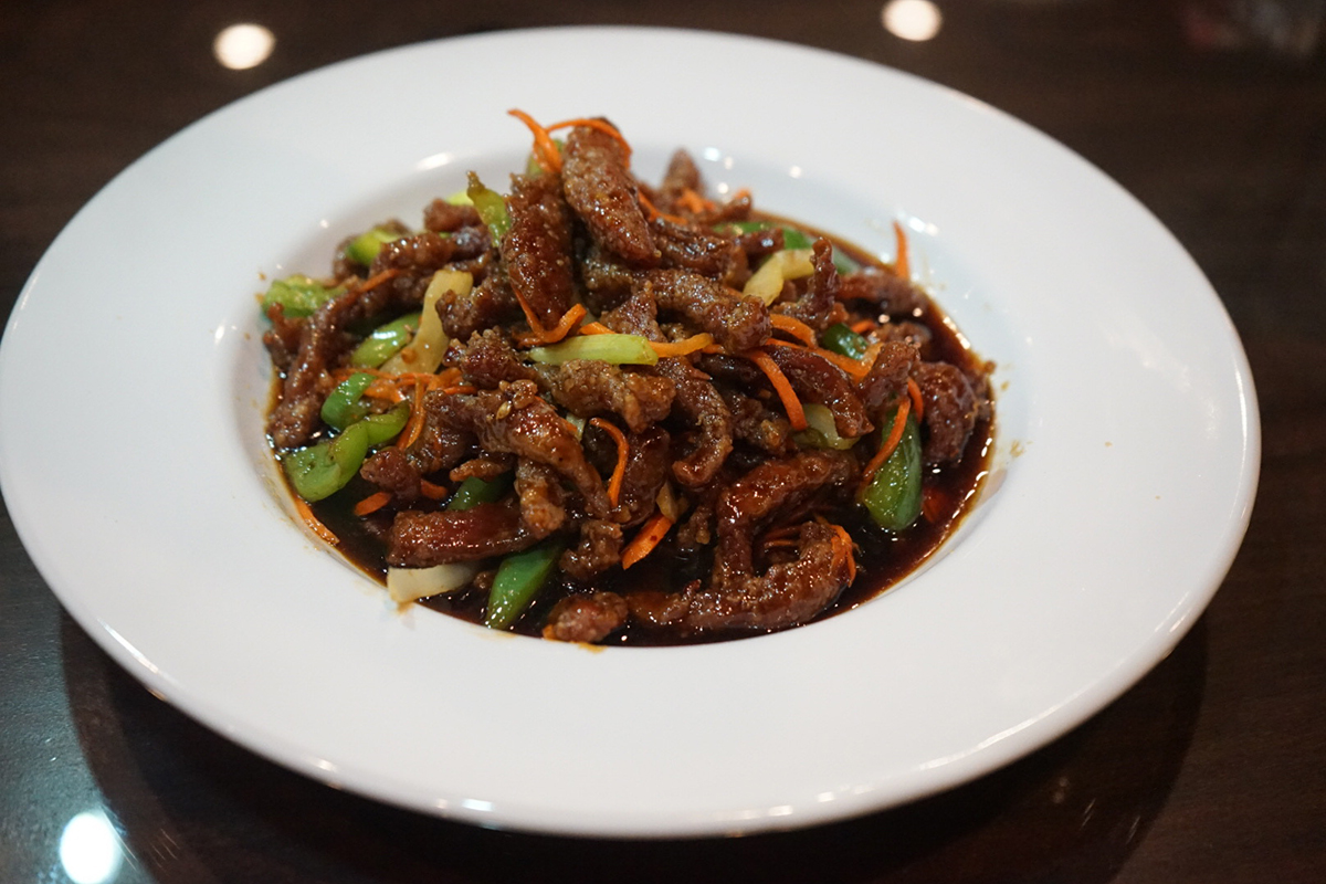 Tender beef strips with green peppers and carrots in black pepper sauce at Peking Gourmet, a Chinese Restaurant in Frederick