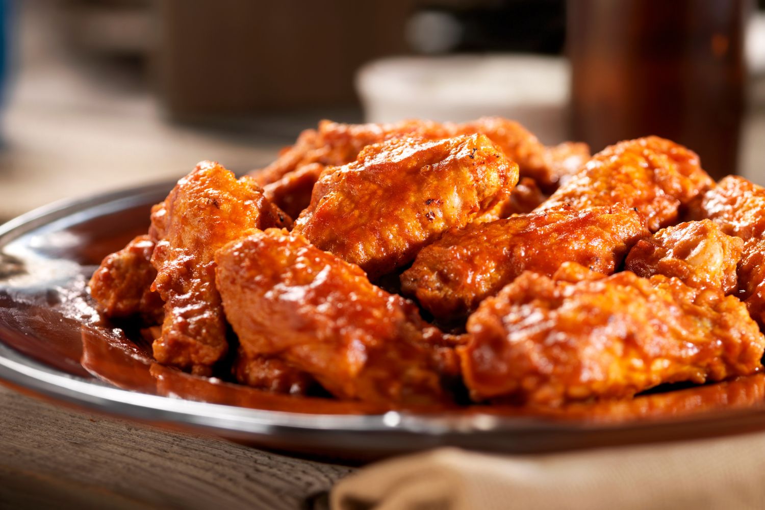 Chicken wings coated in rich, spicy glaze at Philly Steak & Wings Of Clermont, a Fast - Food Restaurant in Clermont