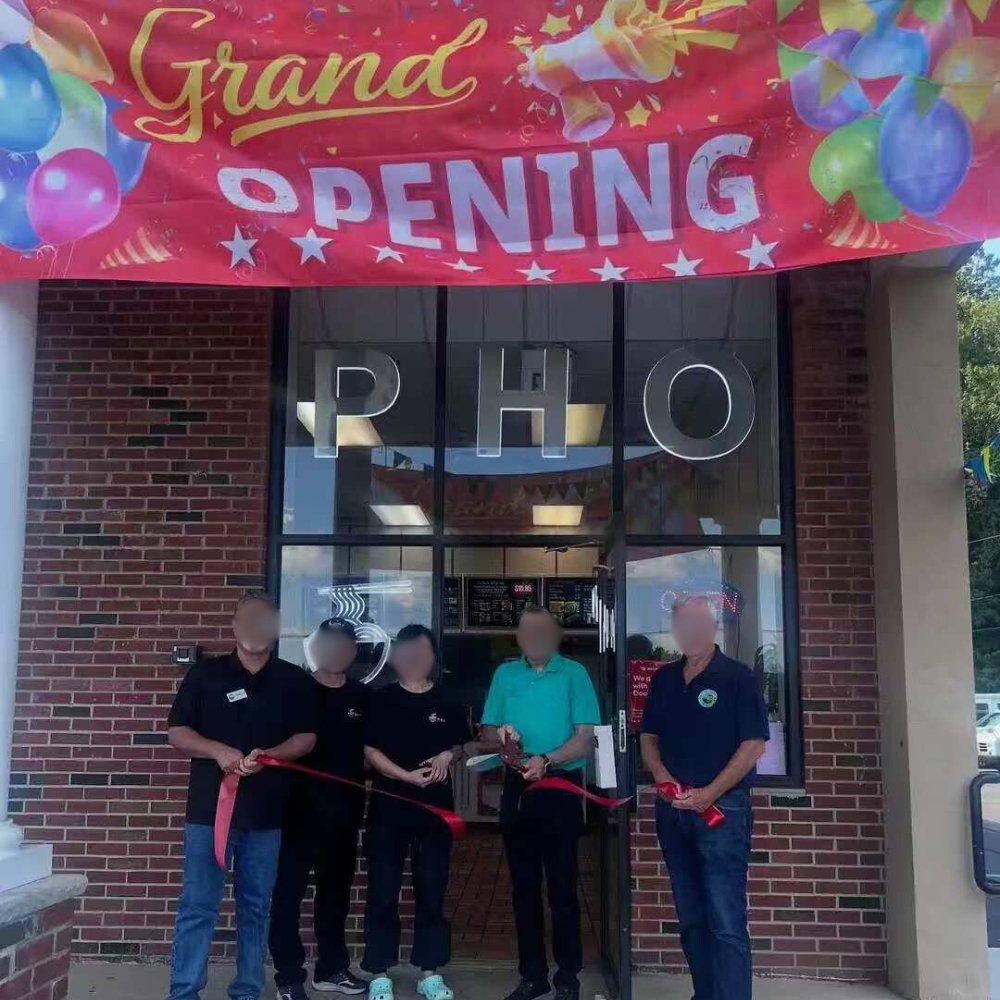 Grand opening ribbon-cutting at PHO 1, a Vietnamese Restaurant in Flanders.