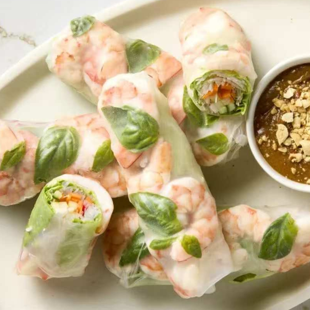 Shrimp spring rolls with dipping sauce at PHO 1, a Vietnamese Restaurant in Flanders.