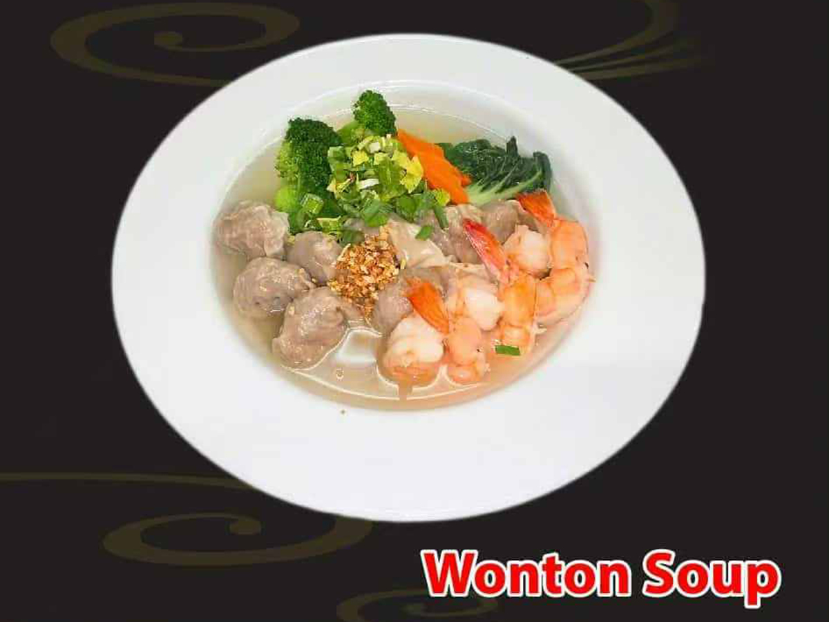 Pho-House-Asian-Fusion-Restaurant-Wonton-Soup-Carmichael A comforting bowl of wonton soup with shrimp and meatballs at Pho House, a Asian Fusion Restaurant in Carmichael