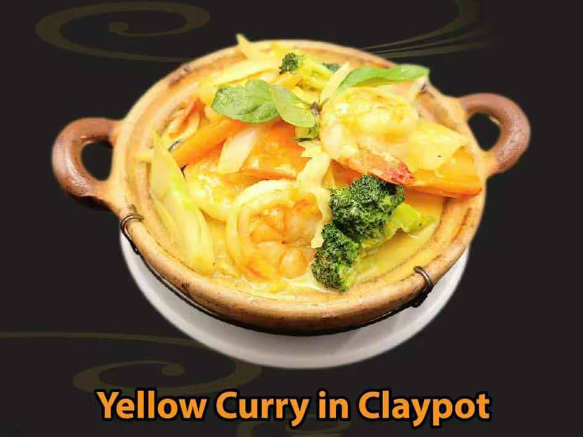Pho-House-Asian-Fusion-Restaurant-Yellow-Curry-in-Claypot-Carmichael Shrimp and vegetable yellow curry served in a clay pot at Pho House, a Asian Fusion Restaurant in Carmichael