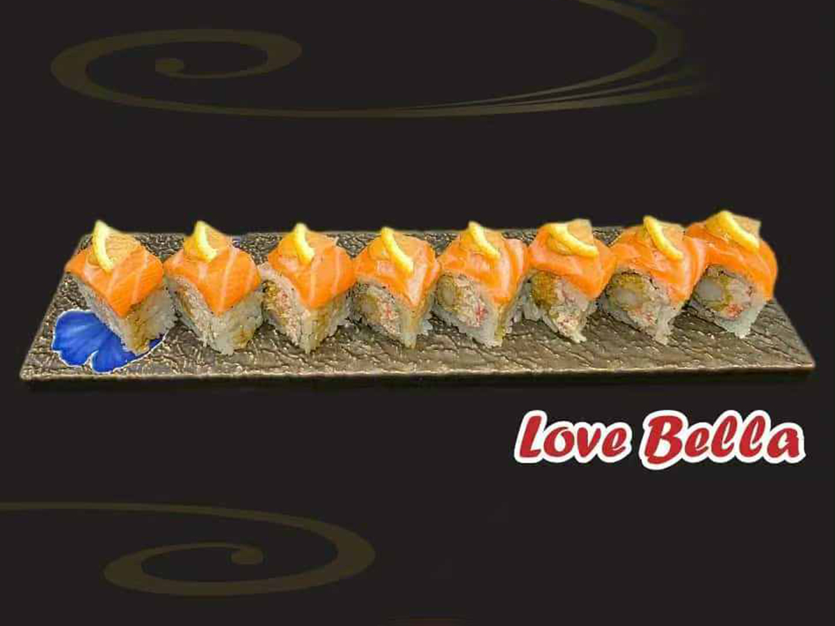 Pho-House-Asian-Fusion-Restaurant-Love-Bella-Roll-Carmichael Love Bella specialty roll topped with salmon and lemon slices at Pho House, a Asian Fusion Restaurant in Carmichael
