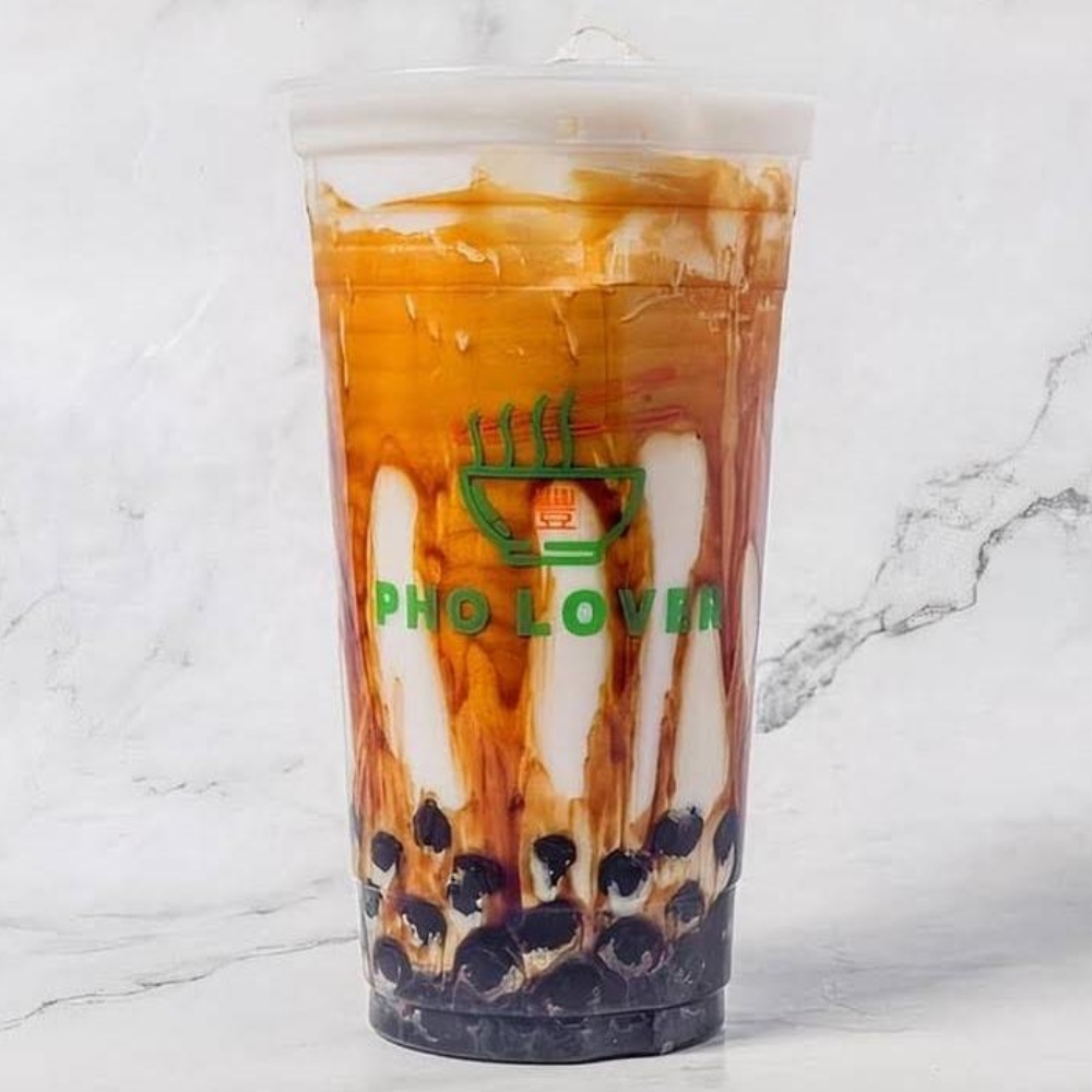 Tall cup of brown sugar bubble tea with tapioca pearls at Pho Lover, a Vietnamese Restaurant in Galesburg