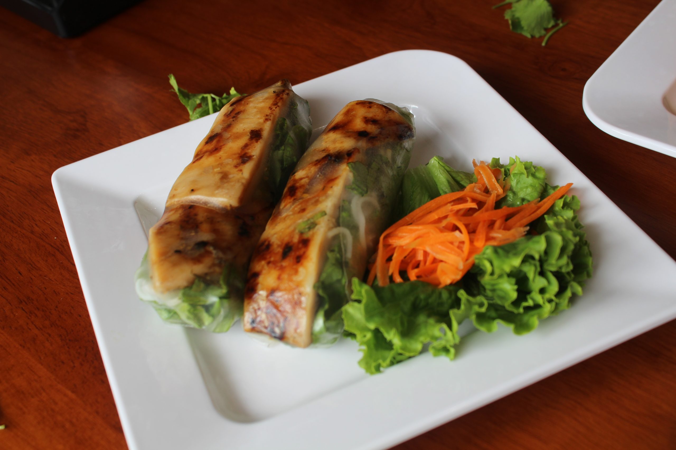 Grilled Pork Spring Rolls - Fresh rolls with grilled pork, veggies & rice noodles at Pho Plus 1, a Vietnamese restaurant in Oklahoma City