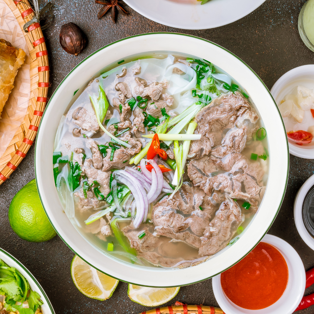 Pho-Plus-1-Vietnamese-restaurant-Raw-Beef-Pho-Platter-Oklahoma-City Raw Beef Pho Platter - Thin - sliced raw beef, rice noodles, and fresh herbs in broth at Pho Plus 1, a Vietnamese restaurant in Oklahoma City